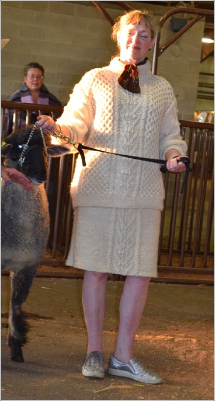 Gwen Porter models her knitted sweater and skirt. Photo: Peggy Lundquist.